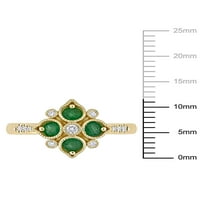 Donje geometrijski prsten od žutog zlata 14 karata s smaragdu T. G. W. i dragulj T. W. u karatima Miabella