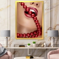 Dizajnerska umjetnost usta djevojke s crvenim ružem koji grize crvene bisere, uokvireni moderni umjetnički tisak
